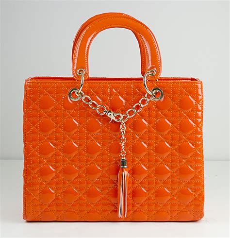 designer large orange purses handbags